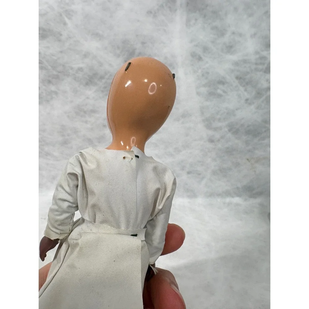Vintage Composition Doll Blue Eyes White Nurse Gown 7.5 Inch Hand Painted Face